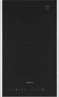 A black induction hob with illuminated controls and markings for cooking zones.