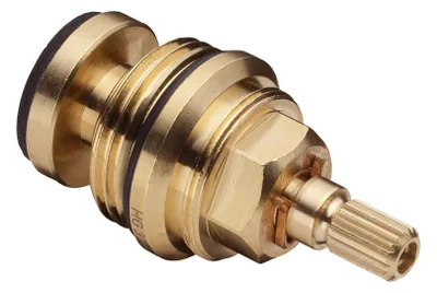A close-up studio shot of a brass faucet valve stem.
