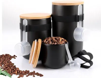 Immagine prodotto di Set di 3 contenitori in Vetroceramica neri con coperchio per caffè, zucchero, tè e spezie