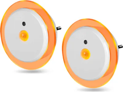 Two round LED night lights with orange trim are shown against a white background.