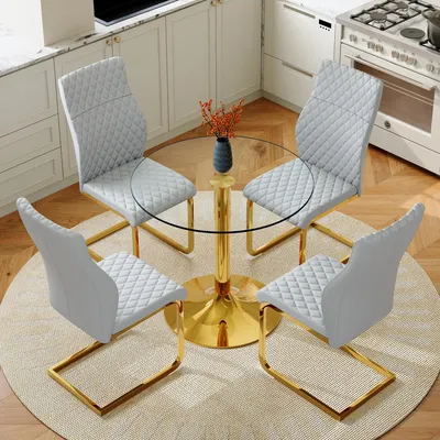 Produktbild von 4er Set runder Esstisch aus gehärtetem Glas, 85 cm Durchmesser, goldene Metallstützen, vier hellgrau-goldene moderne Esszimmerstühle