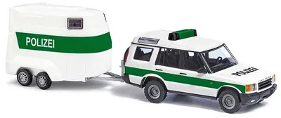 Immagine prodotto di Busch 51936 - 1/87 / H0 Land Rover Discovery Polizia + rimorchio - Nuovo