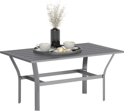 A dark gray metal coffee table with a slatted top, set against a white background. Two coffee cups and a vase with dried flowers are placed on the table.