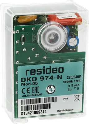 A close-up view of a Resideo DKO 974-N control unit, showing its internal circuitry and labeling.
