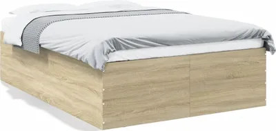 A bed frame with white bedding.