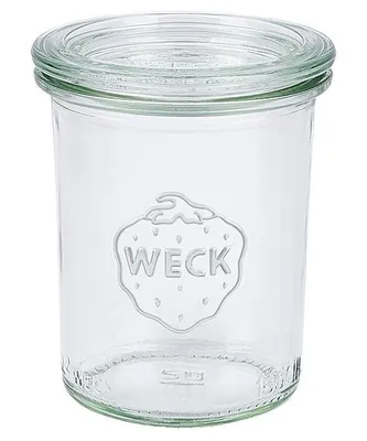 A clear glass jar with a lid, featuring the brand logo embossed on the front.