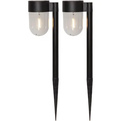 Two black solar-powered pathway lights with clear glass bulbs are shown against a white background.