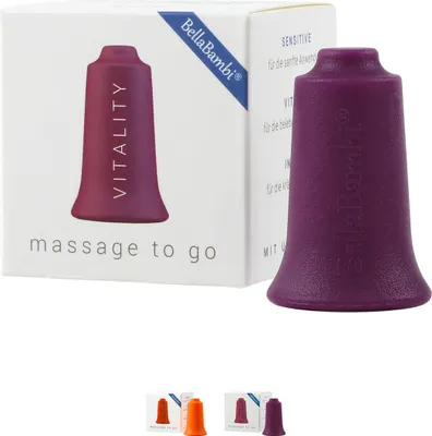 A product box with a massage tool and a separate massage tool.
