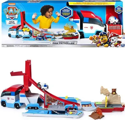 The image shows the packaging of a Paw Patrol toy transporter, with a child playing with the toy on the box. Below the packaging, the toy itself is displayed.