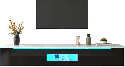 A modern TV stand with a television mounted above it.