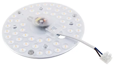 A circular LED light module with a central driver and attached wires, presented on a white background.