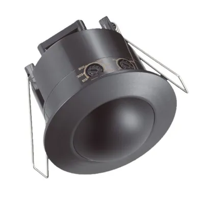 A black motion sensor with adjustable dials is shown against a white background.