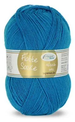 A ball of blue yarn with a label wrapped around it.
