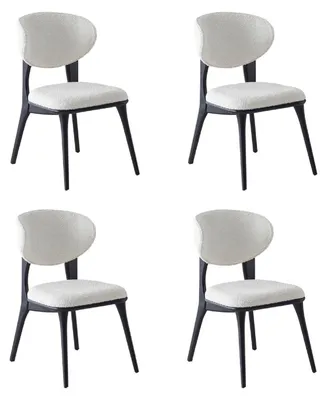 Image de Ensemble de 4 chaises modernes, blanches et noires, élégantes, parfaites pour une salle à manger. Fauteuils rembourrés