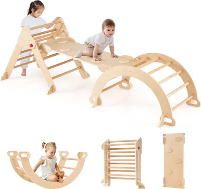 Children playing on a wooden climbing structure indoors.