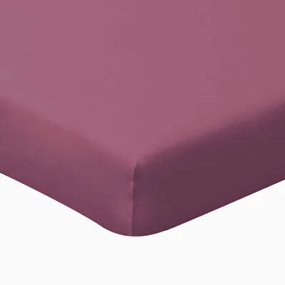 A close-up view of a folded bed sheet.