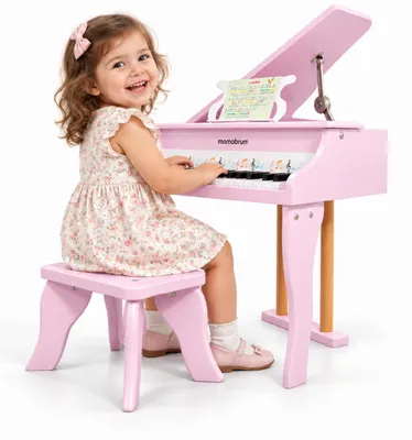 Immagine prodotto di Mamabrum, pianoforte giocattolo in legno per bambini, con 30 tasti e coperchio a ribalta, colore rosa. Suono meccanico, non necessita di batterie. Include sgabello e leggio. Adatto a bambini dai 3 anni in su