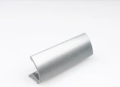 A silver-colored door handle on a white background.