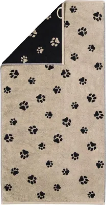 A folded towel with a paw print pattern.