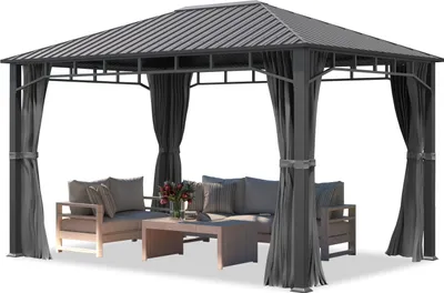 A gazebo with outdoor furniture inside, set against a white background.
