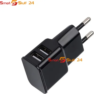 A black dual USB charger with European-style prongs, shown against a white background.