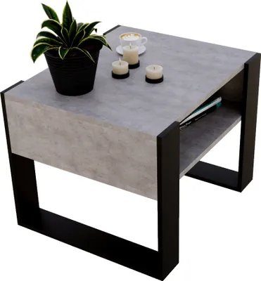 A modern rectangular coffee table with a concrete-look top and black metal legs, featuring a potted plant and candles.