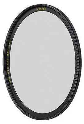 A circular camera lens filter with text around the rim.
