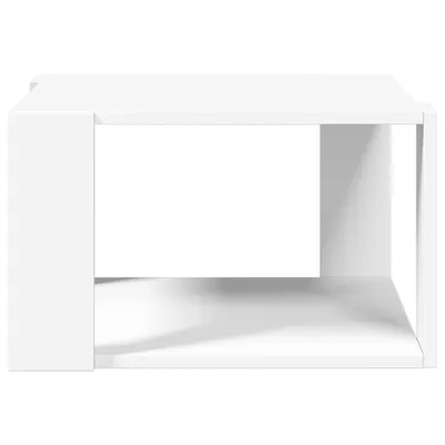 A minimalist white cube-shaped table, shown from the front. The table has an open space in the middle.