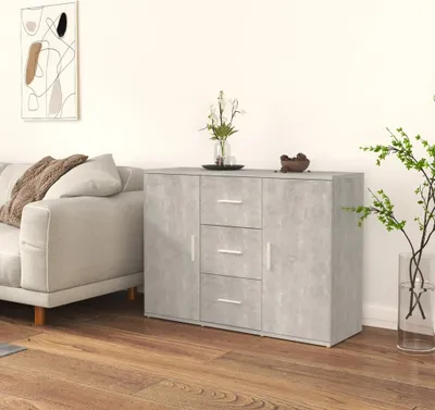 A modern living room scene with a grey sideboard and a sofa.