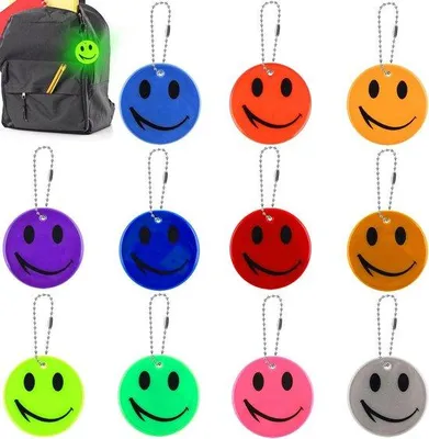 Produktbild von Sicherheitsreflektorhalter - Reflektoren für Kinder - Lächelnder Hänger - 11 Farben - Schultasche - Rucksack - Fahrrad - Wandern - Joggen