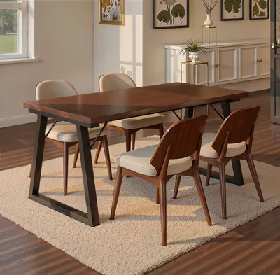 A dining table and chairs set in a well-lit room with a window and artwork on the wall.