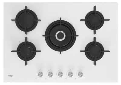 A top-down view of a white gas stovetop with five black burners and silver control knobs at the bottom.