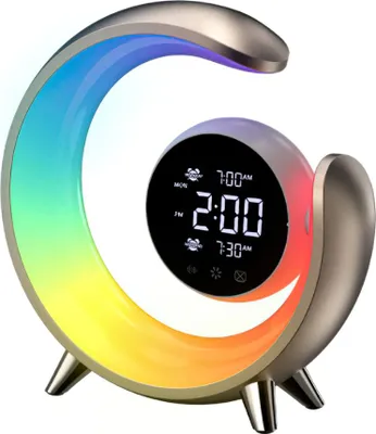 A close-up studio shot of a modern RGB night light alarm clock with a rainbow gradient.