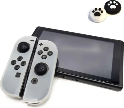 Produktbild von Thumbgrips - Hoesjes & Skins + Thumb Grips voor Nintendo Switch 1 - Performance Gaming Case - Soft Grip Covers - Anti-Slip Joy-Con Controller Accessoires - Wit + Pootjes Zwart/Wit -