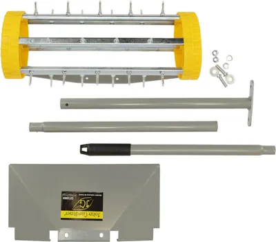 A disassembled lawn aerator kit laid out on a white background.