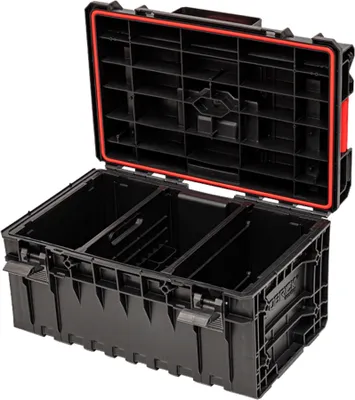 An open black tool box with red trim, showing its internal compartments.
