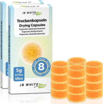Produktbild von JB White, Trockenkapseln für Hörgeräte, 16 Stück, Weiß, mit Farbindikator, einzeln versiegelt, Kieselgelperlen, 31 mm Durchmesser, 15 mm Höhe, 3 Jahre haltbar, 20 % mehr Inhalt.