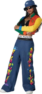 A woman posing in a hip-hop outfit.