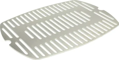 A silver metal grill grate with parallel slots.
