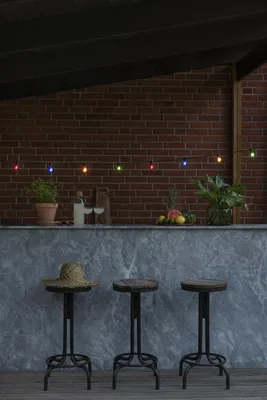Produktbild von Konstsmide LED Biergartenkette, bunt, 40 bunte Birnen / 80 warm weiße Dioden, 6V Außentrafo, schwarzes Kabel - 2387-500