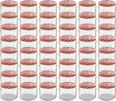 A grid of empty glass jars with red and white checkered lids.