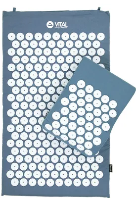 A blue acupressure mat and pillow set is shown against a white background.