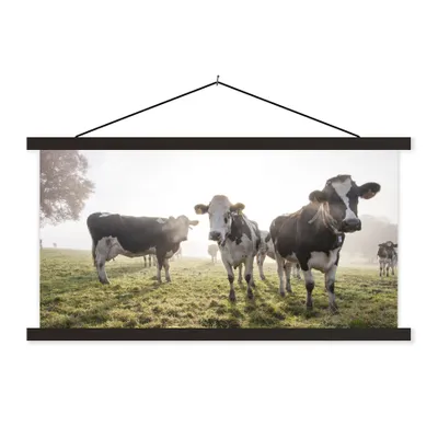 Produktbild von MuchoWow® Textilposter Kühe - Licht - Gras - Tiere 150x75 cm mit schwarzem Rahmen - Posterleiste