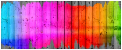 Produktbild von Wallario Premium Glasbild, freischwebende Optik, kräftige Farben, Größe 125 x 50 cm Motiv Holzpaneel - Bemaltes buntes Holz