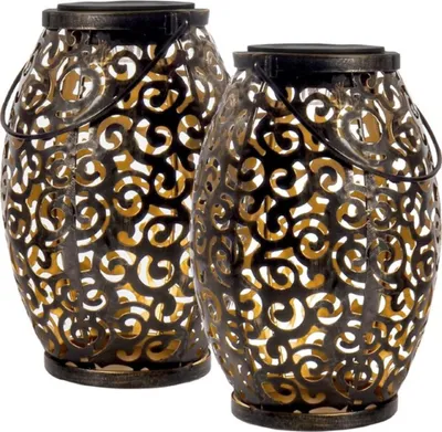 Immagine prodotto di Gadgy Gadgy Lanterna orientale solare - Set da 2 - Bronzo - Metallo - Illuminazione solare da giardino - Illuminazione esterna a LED con sensore giorno/notte - Lampada da tavolo - Lampada a sospensione - Lanterna da giardino - 21,5 x Ø 15 cm