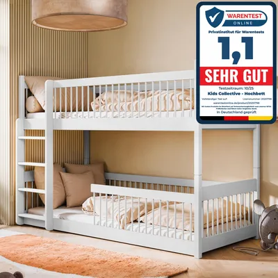 A white bunk bed in a room with beige walls and a textured ceiling lamp.
