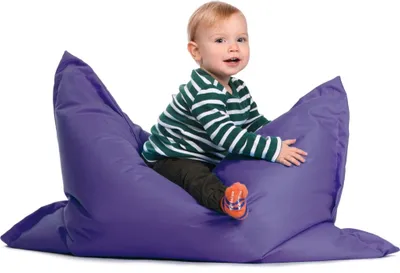 A baby sits on a large purple beanbag chair.