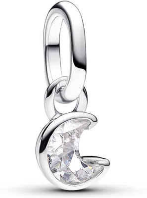 A silver charm with a clear gemstone in the shape of a crescent moon, hanging from a silver chain link.