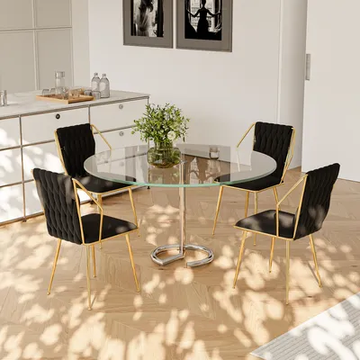 Produktbild von Set aus 2 Esszimmerstühlen, Armlehnen aus Stoff und Metall, gewebte Rückenlehne, goldene Beine, schwarzer Samtbezug, elegantes modernes Design