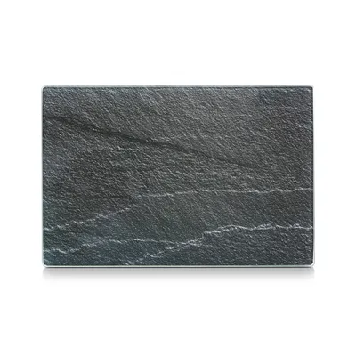 A rectangular glass cutting board with a slate-like texture, presented on a white background.